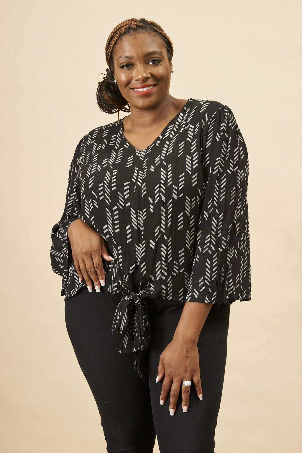 Stylized Feather Tie Knot Blouse in Black + Cream