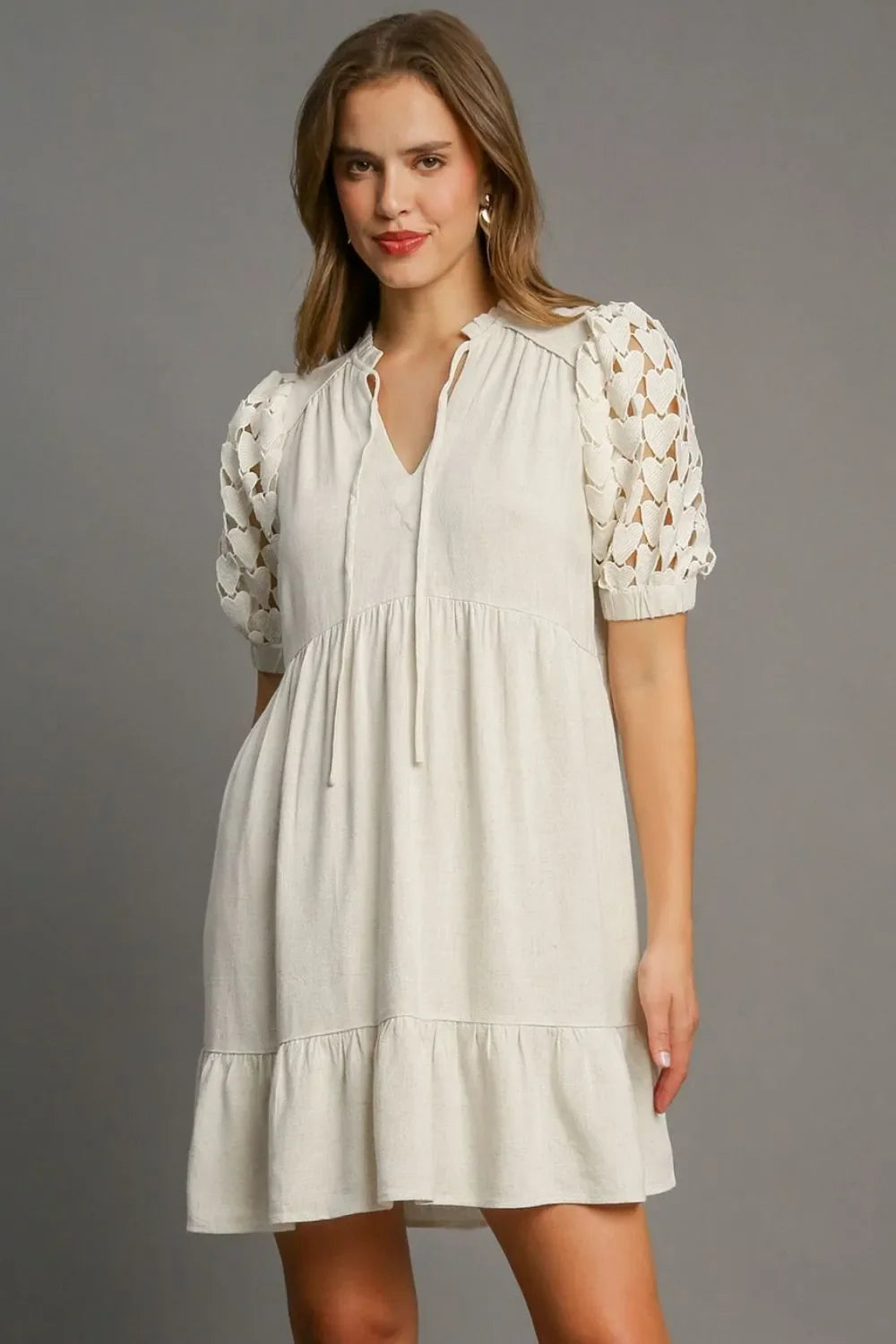 Umgee Full Size Ruffled Hem Heart Lace Sleeve Tie Neck Dress Plus Size