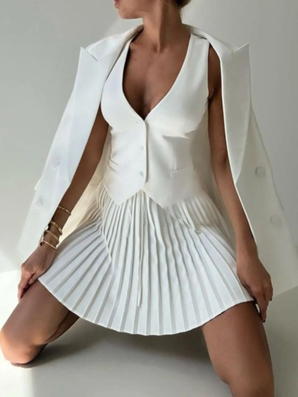 Button Up Vest and Pleated Mini Skirt Set See size chart under “more details”