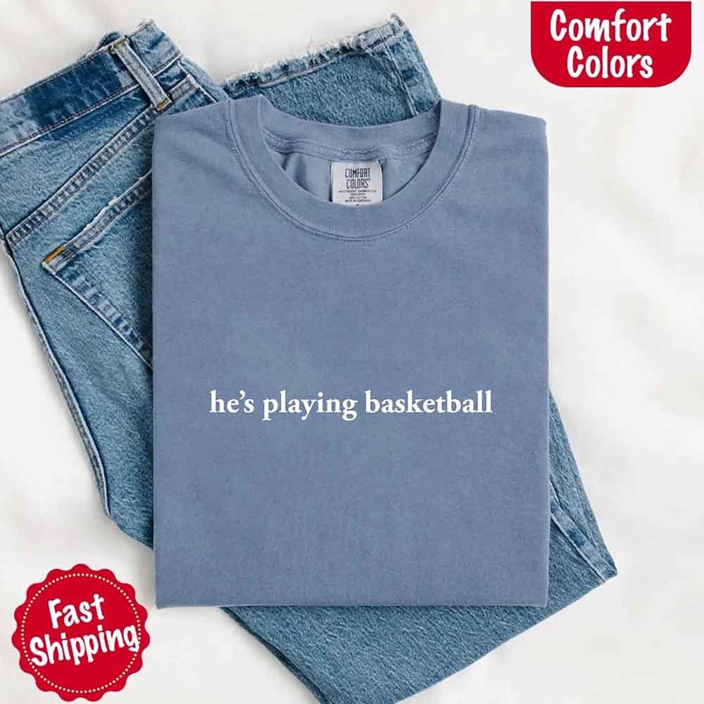 He’s Playing Basketball – Funny Sports Girlfriend Comfort Colors Shirt for Women