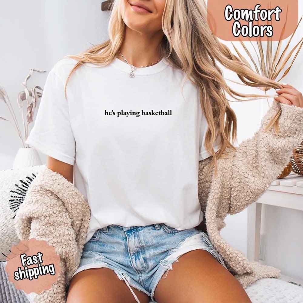 He’s Playing Basketball – Funny Sports Girlfriend Comfort Colors Shirt for Women