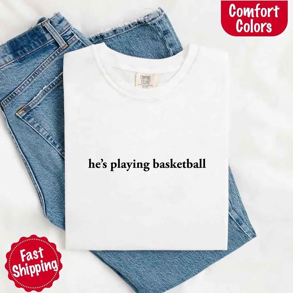 He’s Playing Basketball – Funny Sports Girlfriend Comfort Colors Shirt for Women